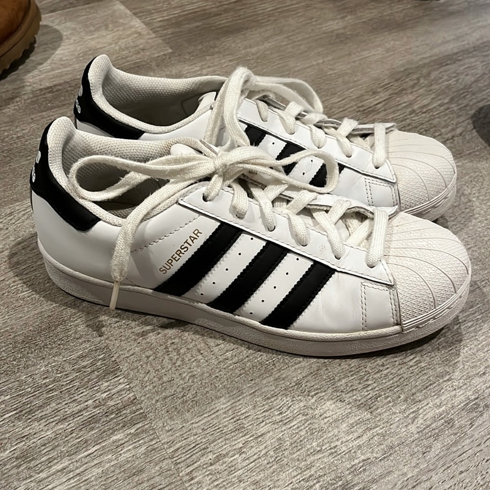 White Adidas Superstars